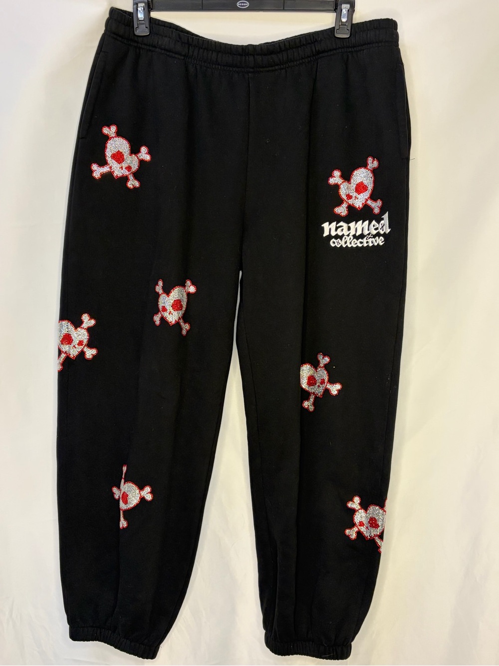 Named Collective Black Joggers with Red Skull Accents